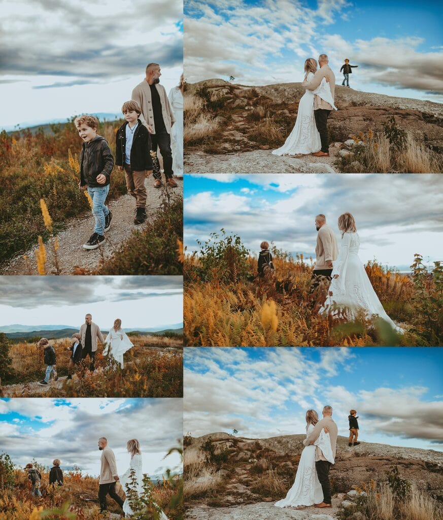 Engagement-style family portrait on mountain overlook showing parents embracing with children playing in background, intimate detail shots and wide landscape scenery